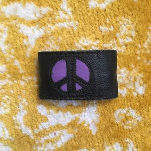 Hand crafted leather peace sign cuff